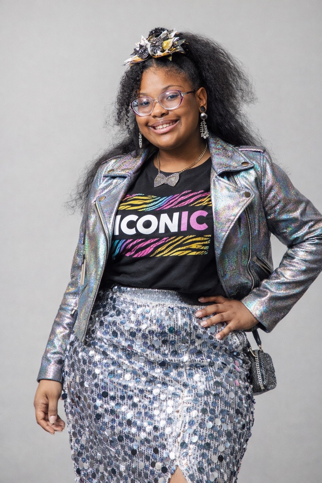 ZaLayaa Jahzara Wandrick — Creator of FIND ME ASAP, wearing sequin jacket and ICONIC shirt